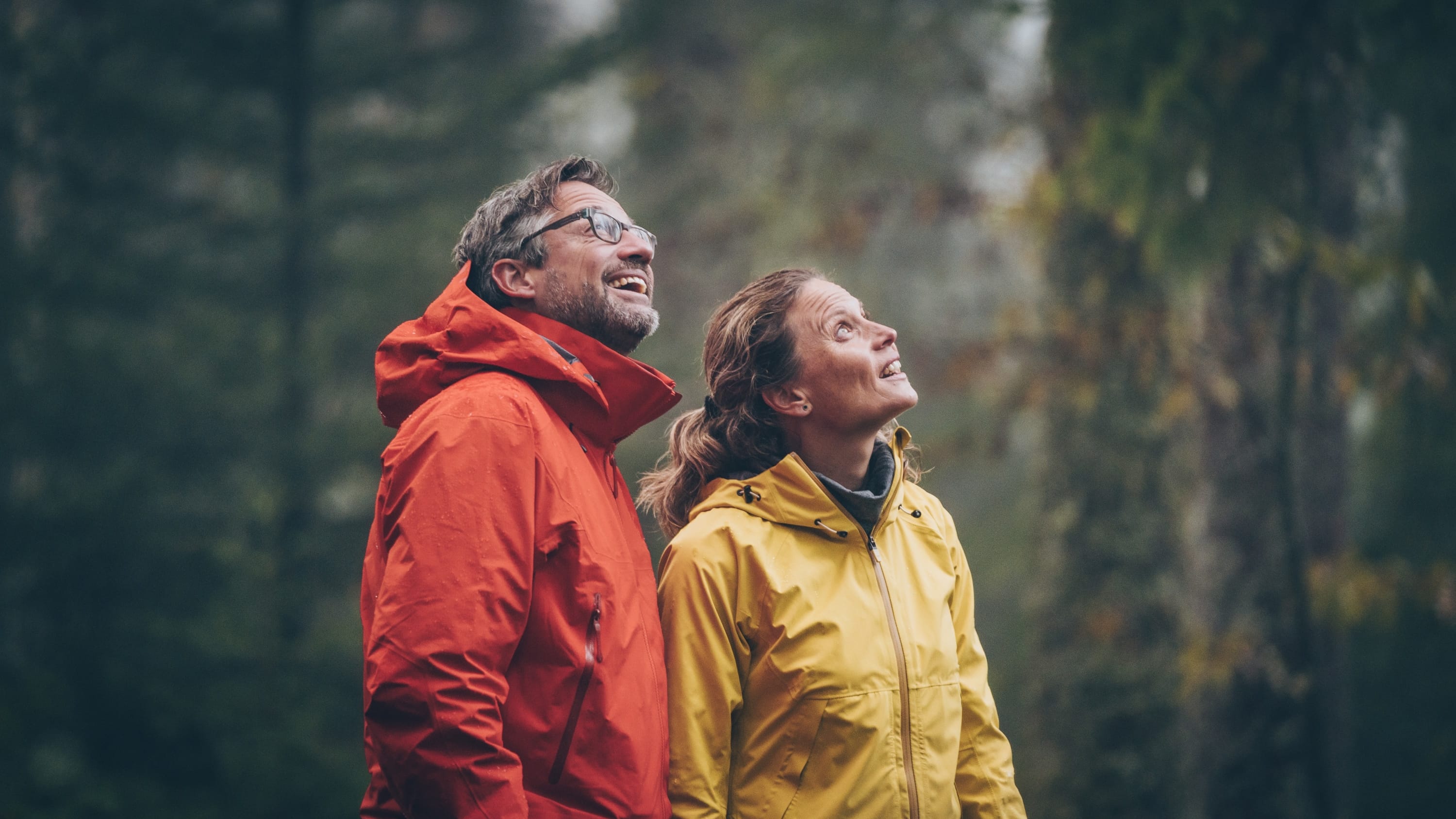 older couple walking in woods after non-hodgkin lymphoma treatment