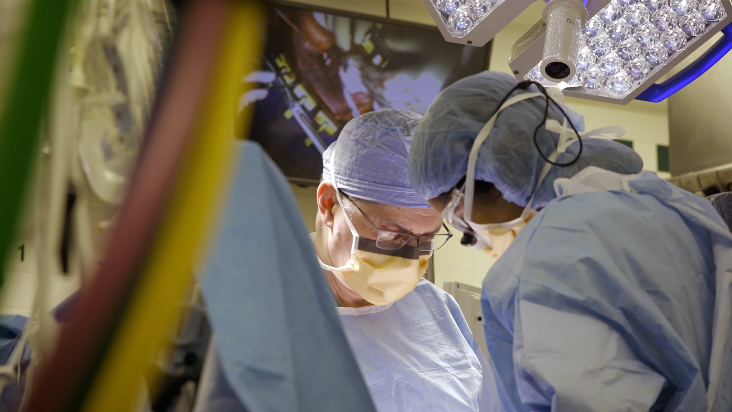Doctors perform open heart surgery, possibly repair a ruptured aortic aneurysm