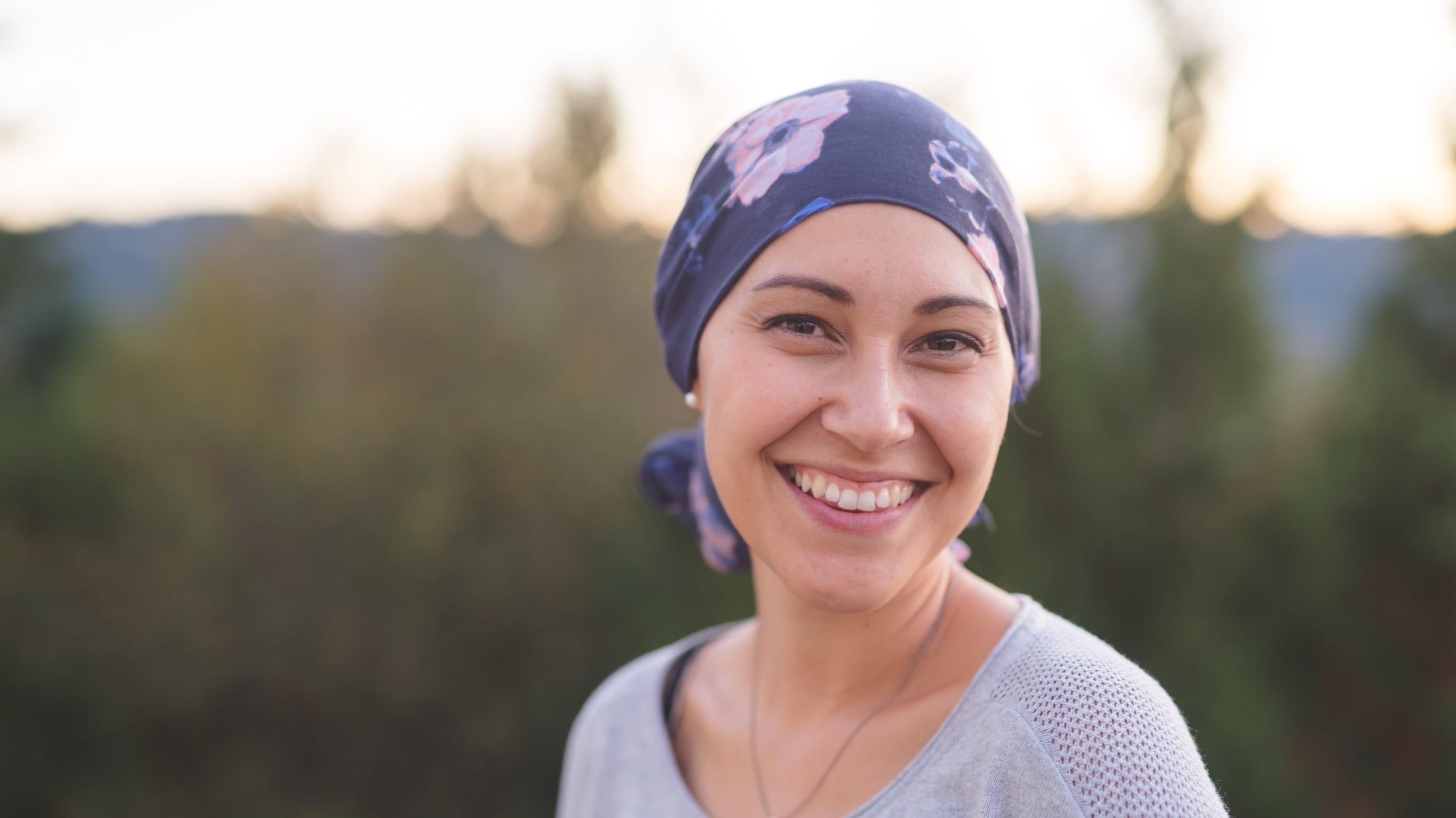 smiling woman with cancer