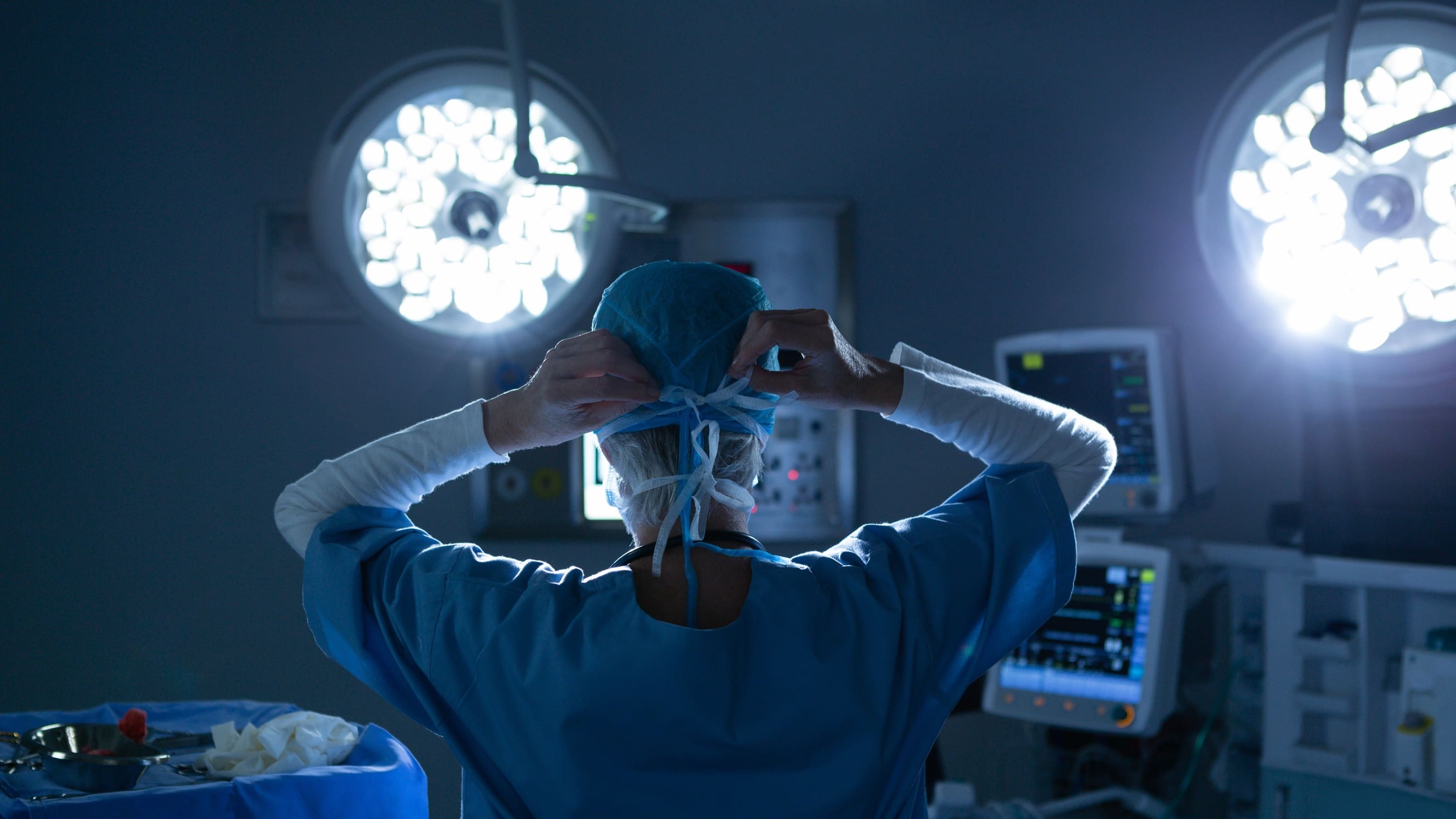 female colorectal surgeon preparing for rectal cancer surgery