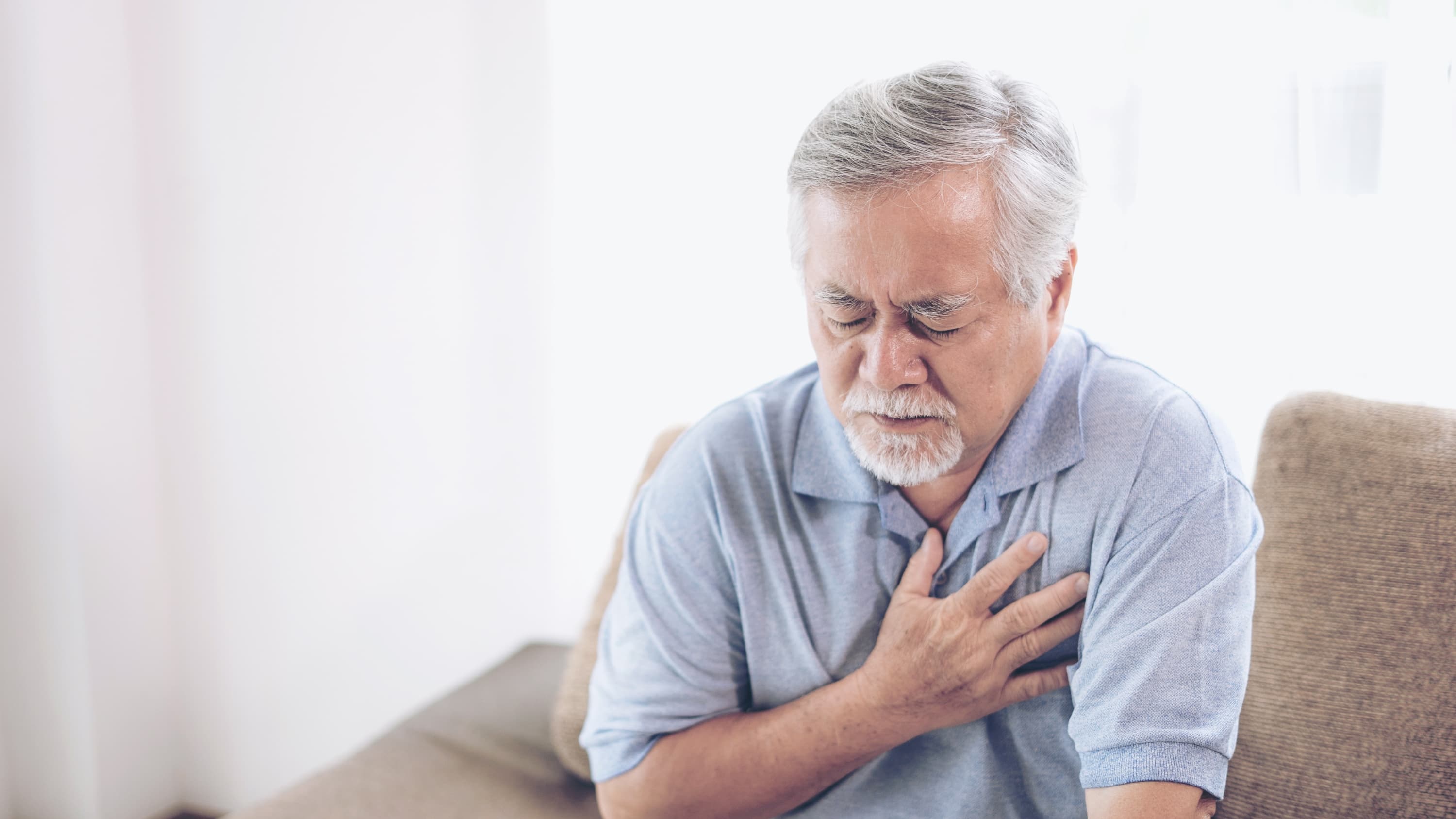 man with chest pain, possibly suffering from cardiac arrest