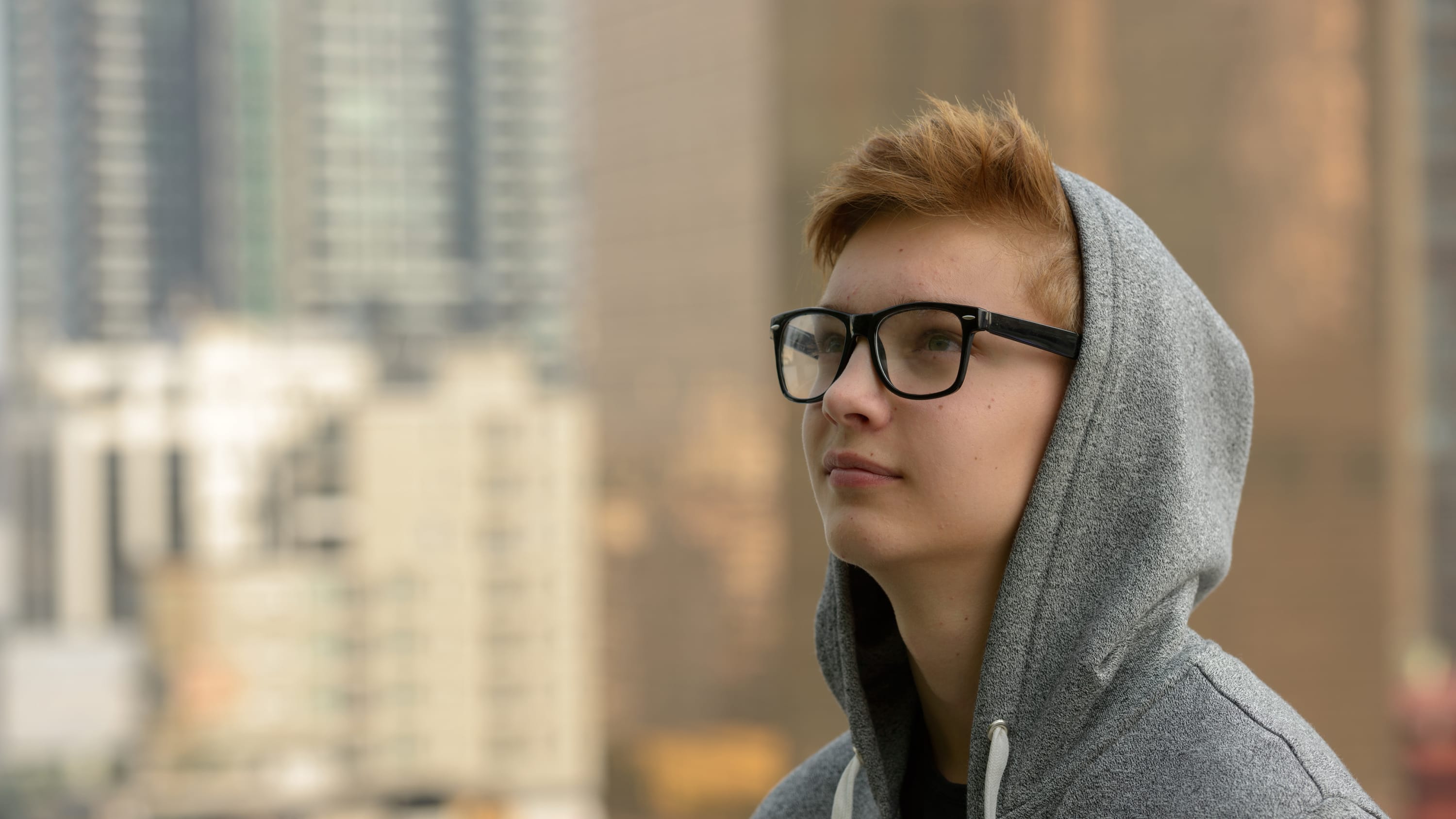 A teenager in a hoodie sweatshirt who could have sarcoma.