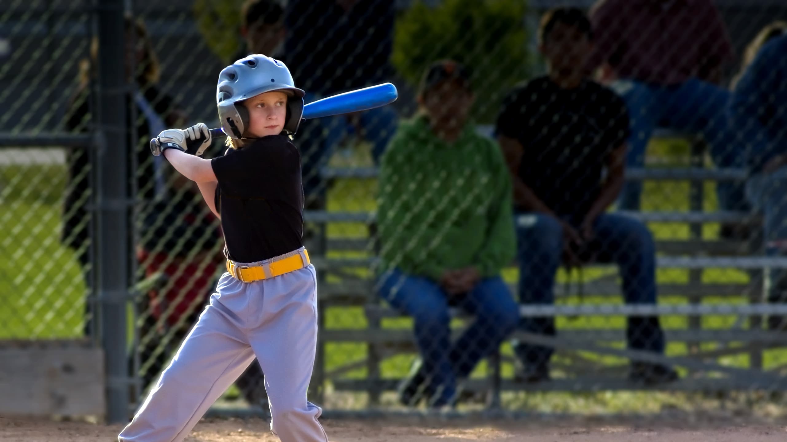 young boy playing baseball