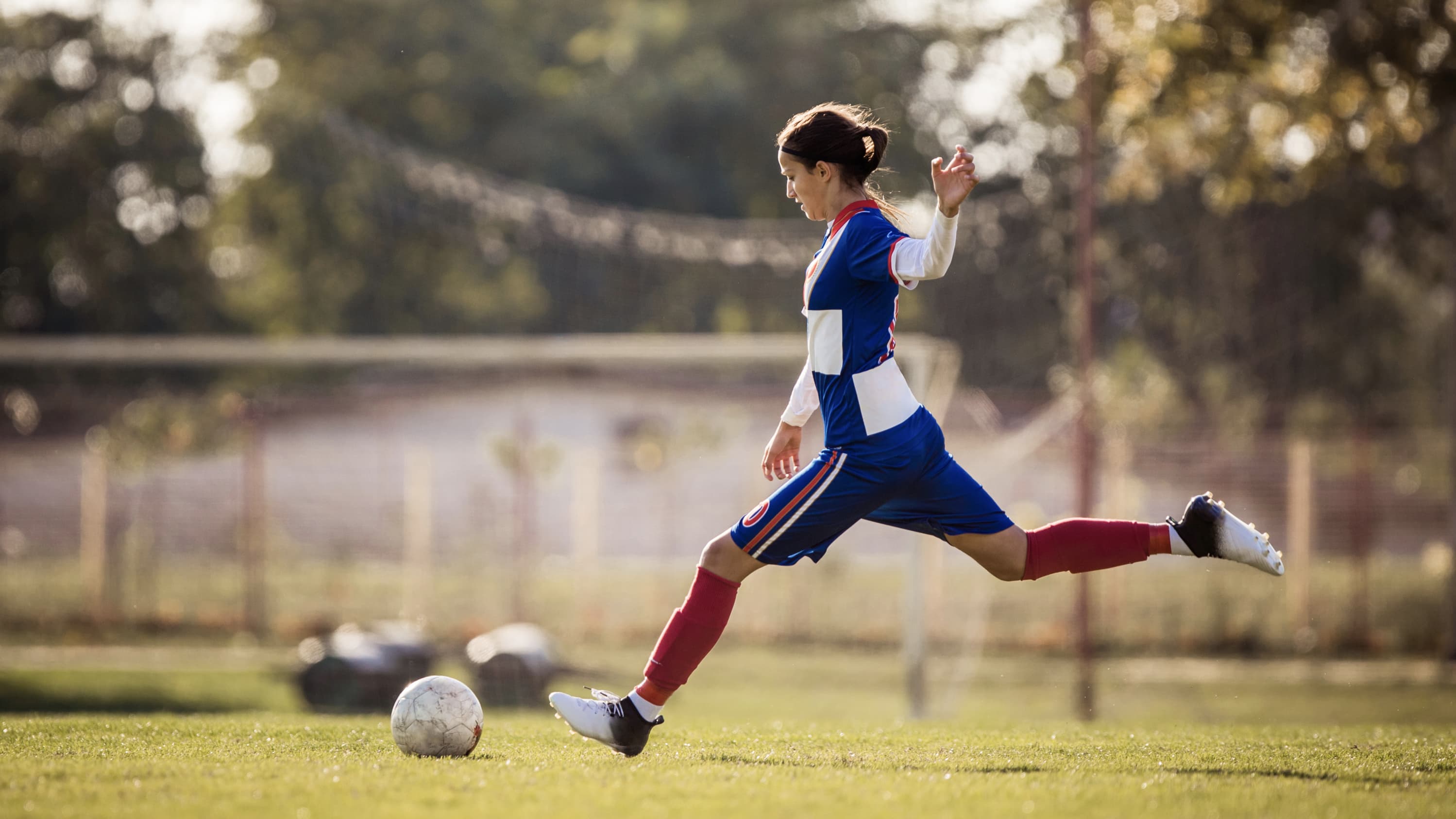 Female soccer player, who may be more at risk for ACL injury than her male peers