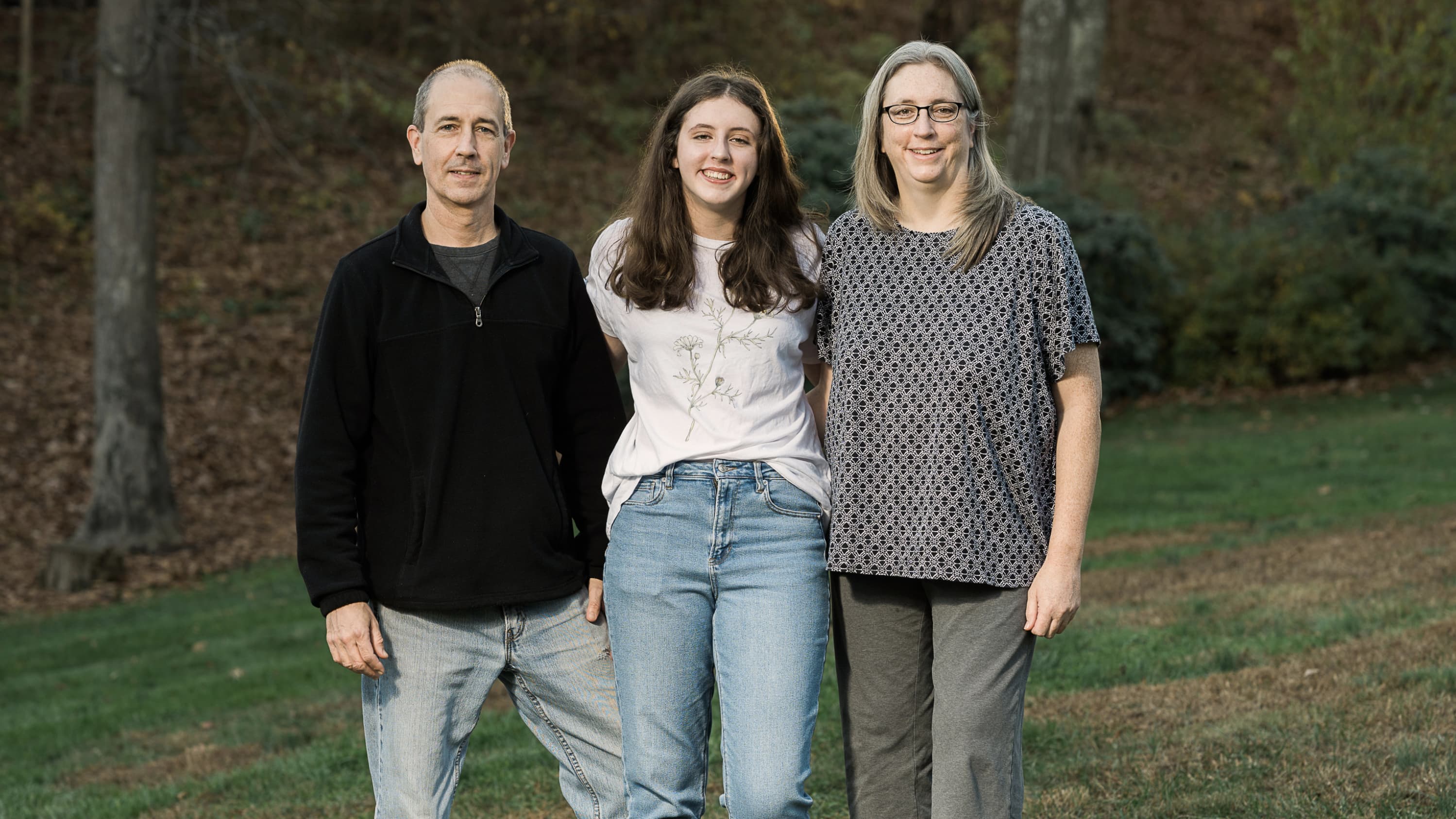 portrait of the Swenson family—Scott, Sarah, and Jennifer