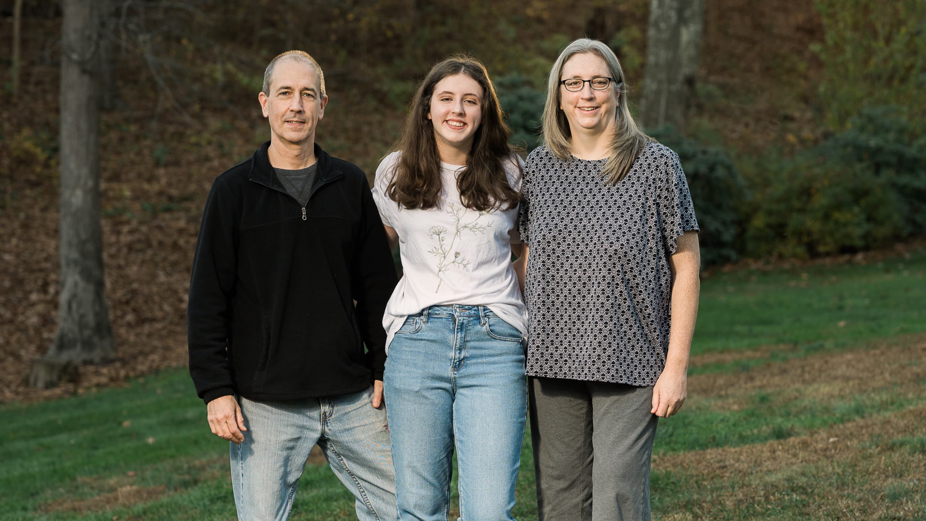 portrait of the Swenson family—Scott, Sarah, and Jennifer