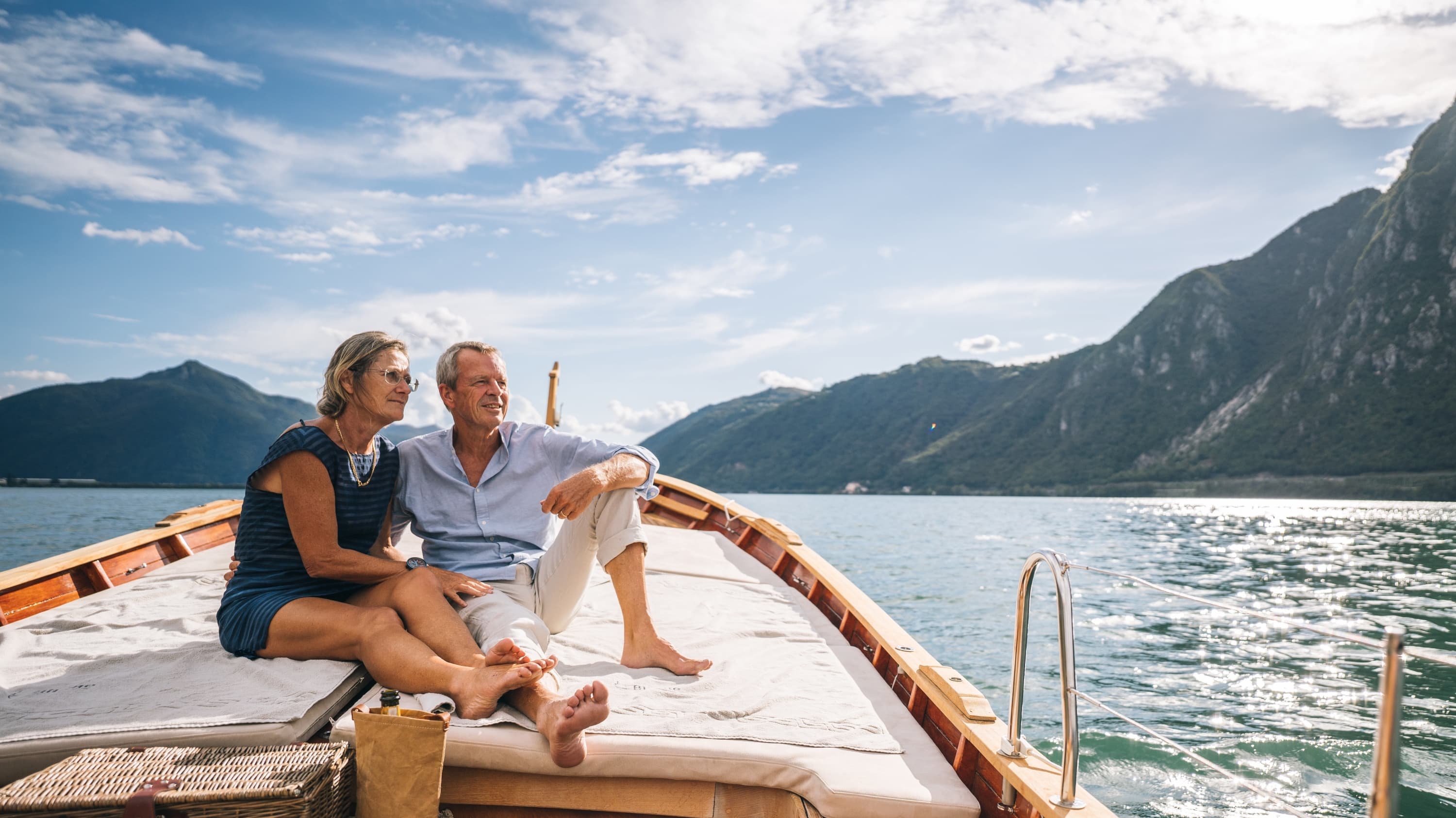 older couple on a boat after his successful treatment for testicular cancer