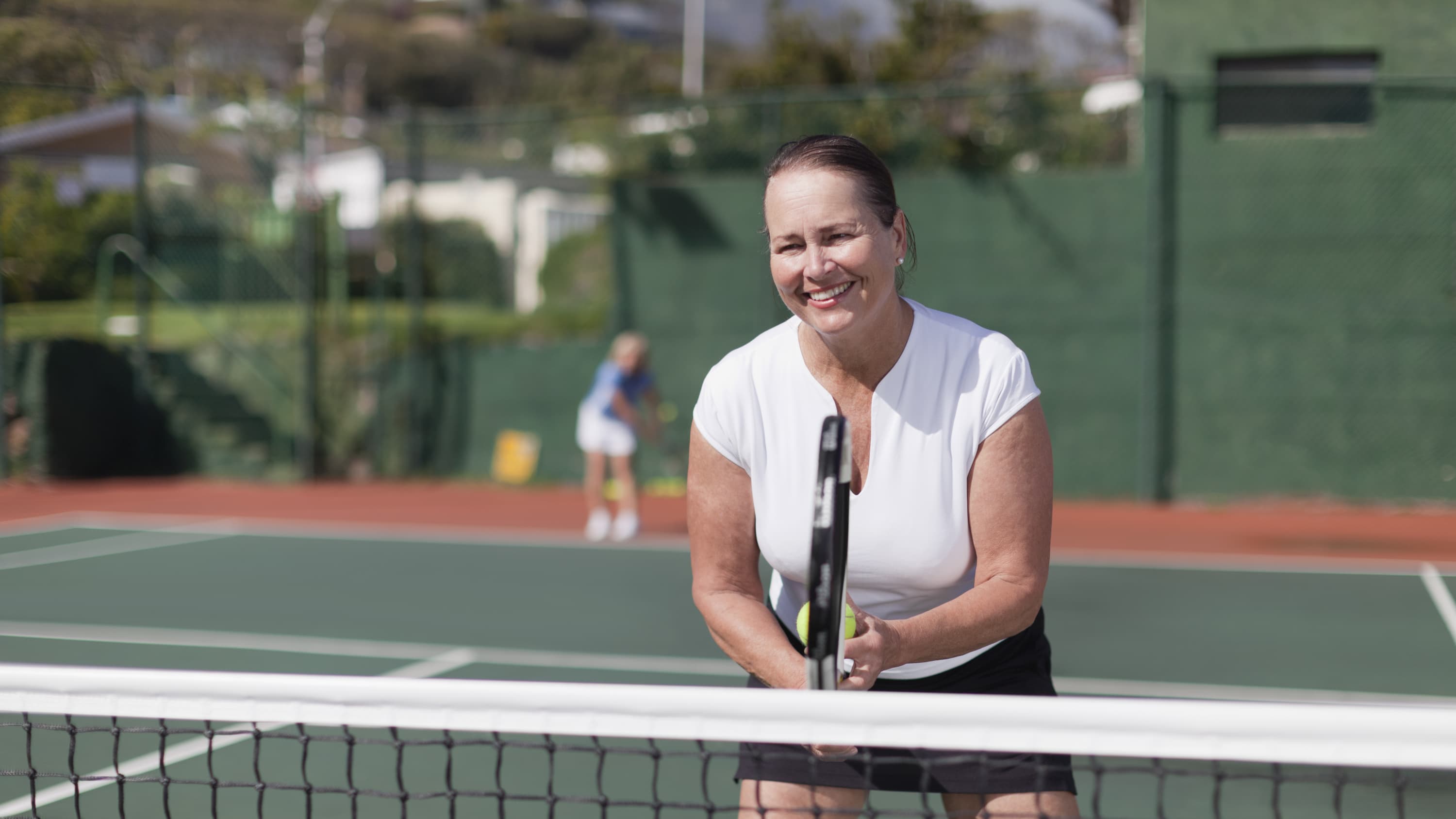 A woman back to enjoying her favorite activity of tennis after being treated for structural heart disease.