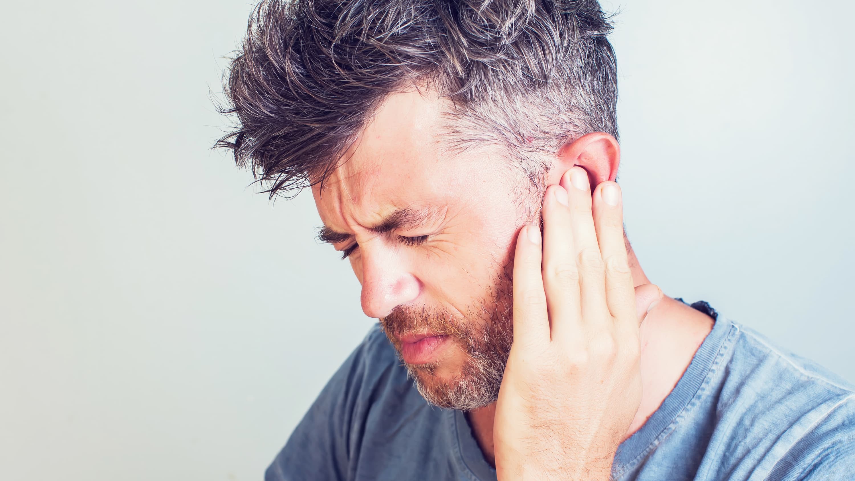 A man suffering from tinnitus