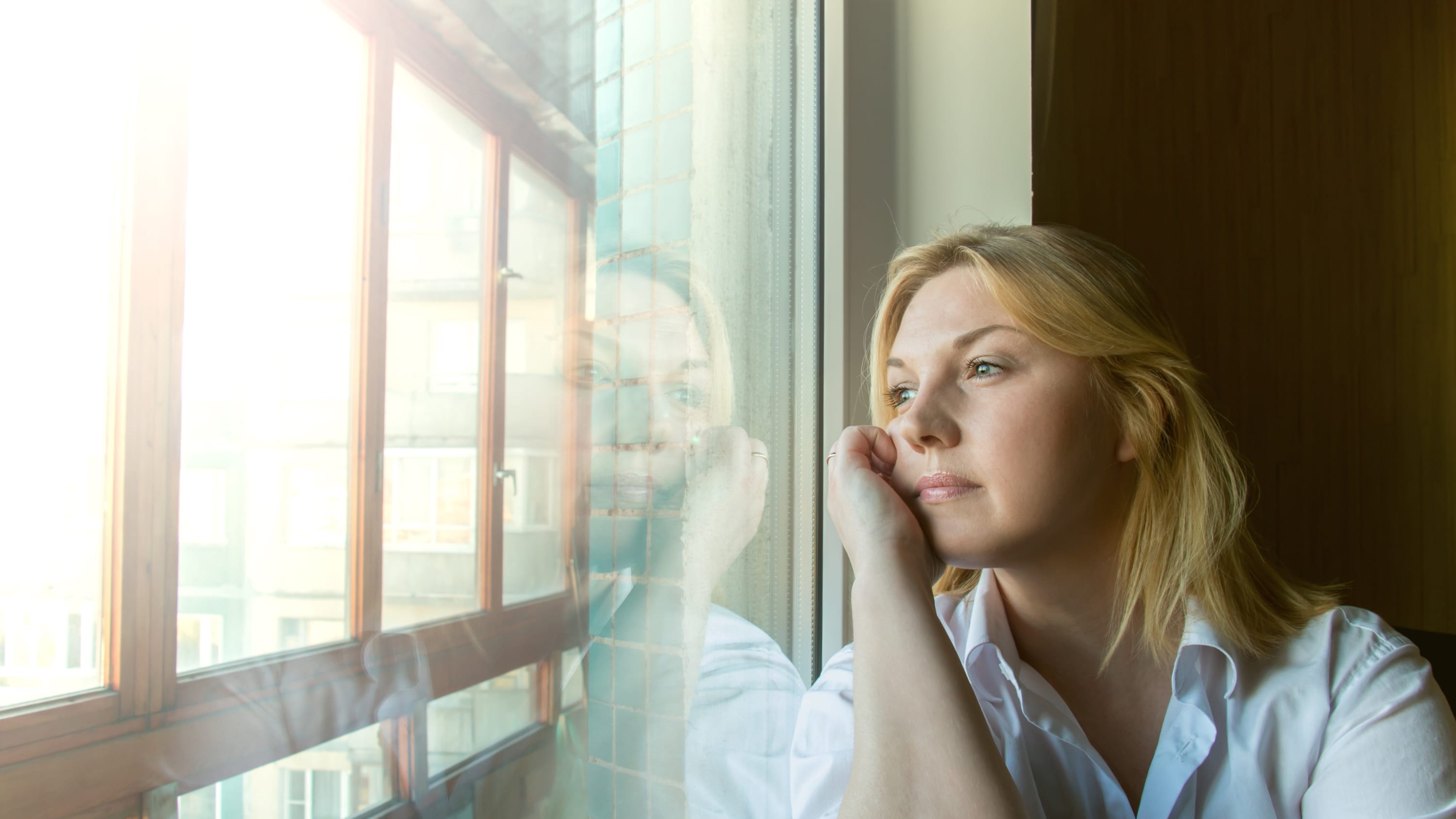 A woman possibly thinking about a colorectal cancer diagnosis