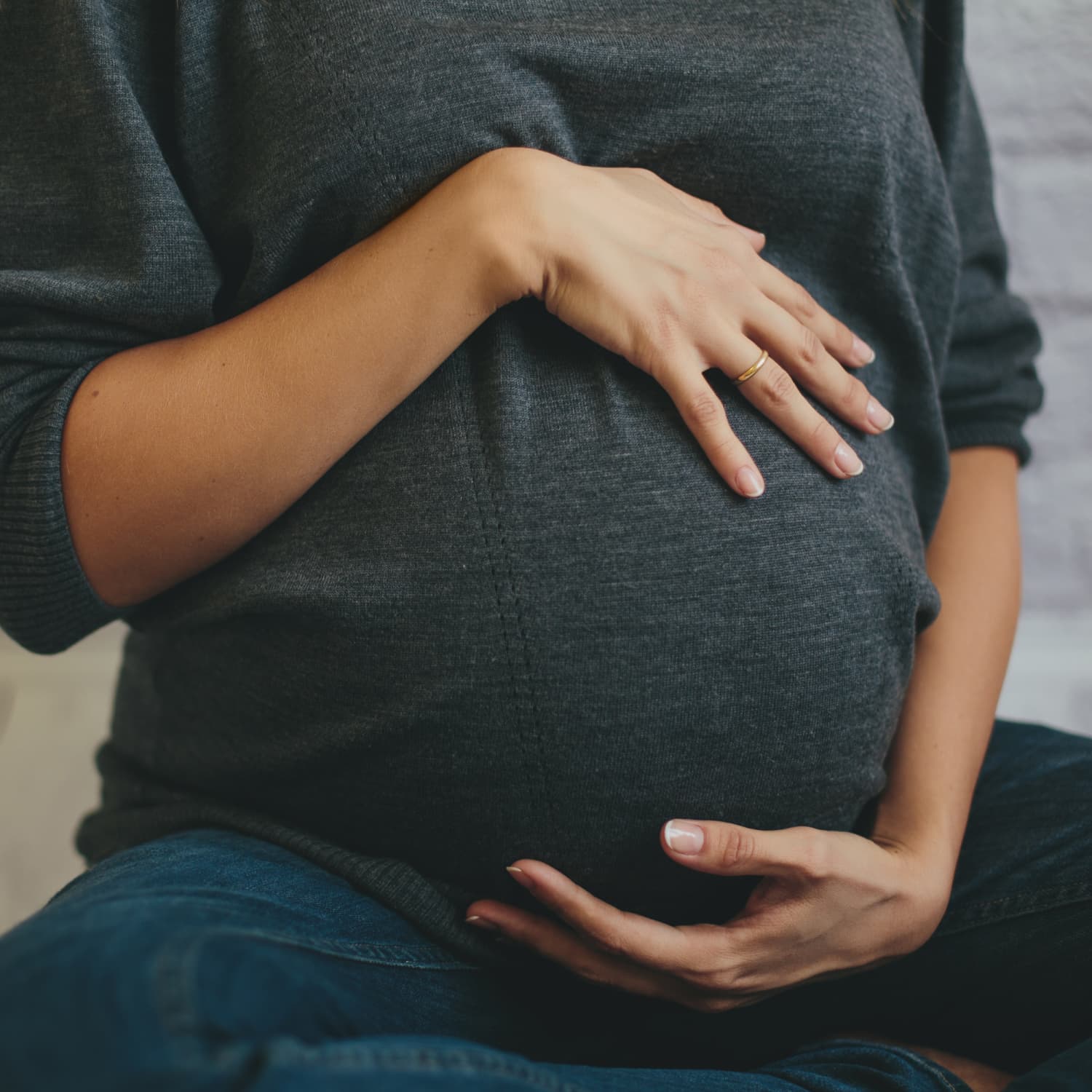 Pregnant belly carrying high shop