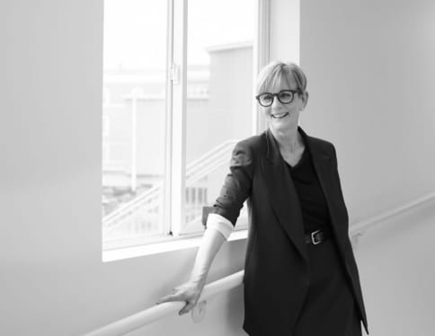 Lisa Sanders standing by window