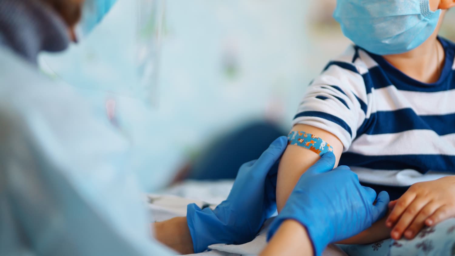 child receiving vaccinations