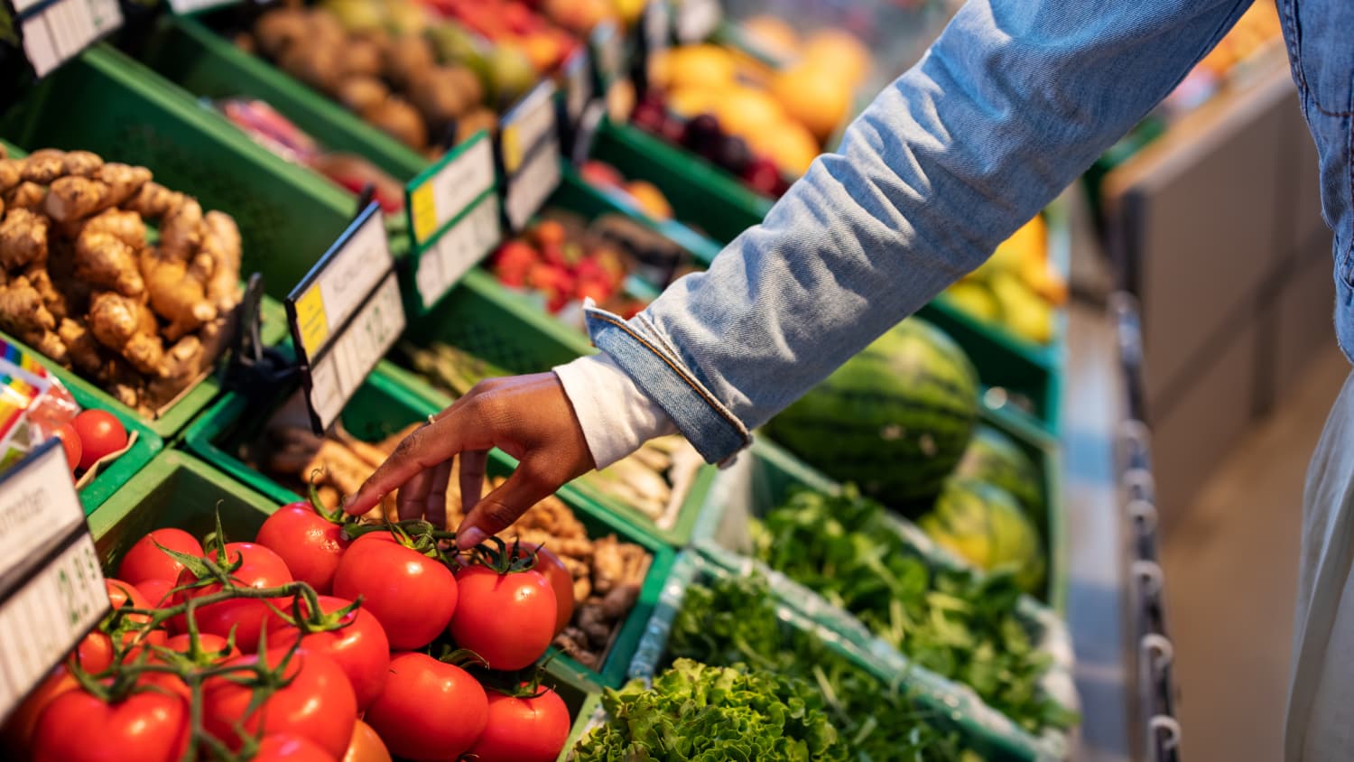 Woman Buying Produce at Grocery Store