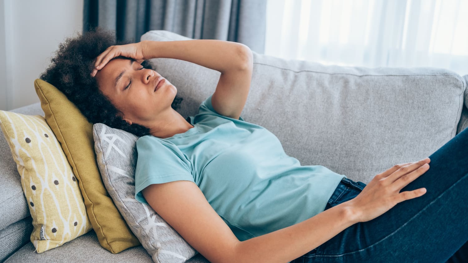 woman sick with flu and covid-19