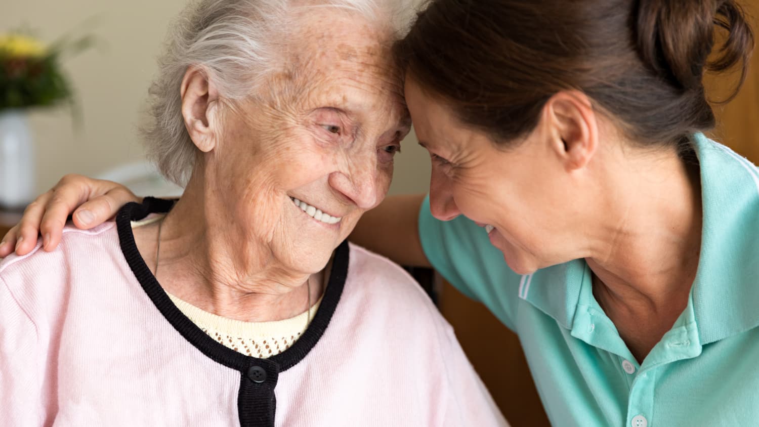 caregiver close with a loved one with Alzheimer's disease