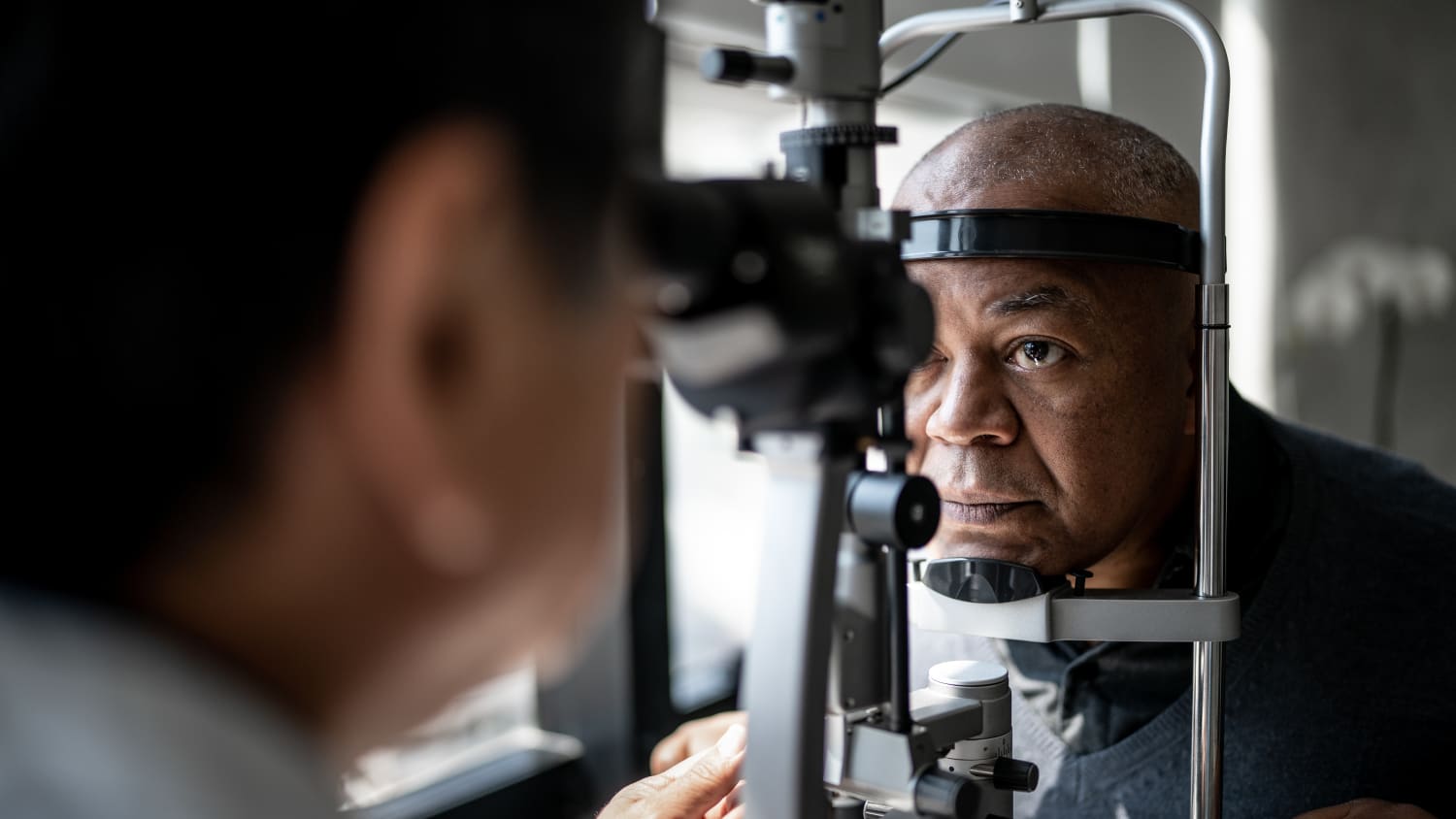 A man undergoes an eye exam that will check for glaucoma.