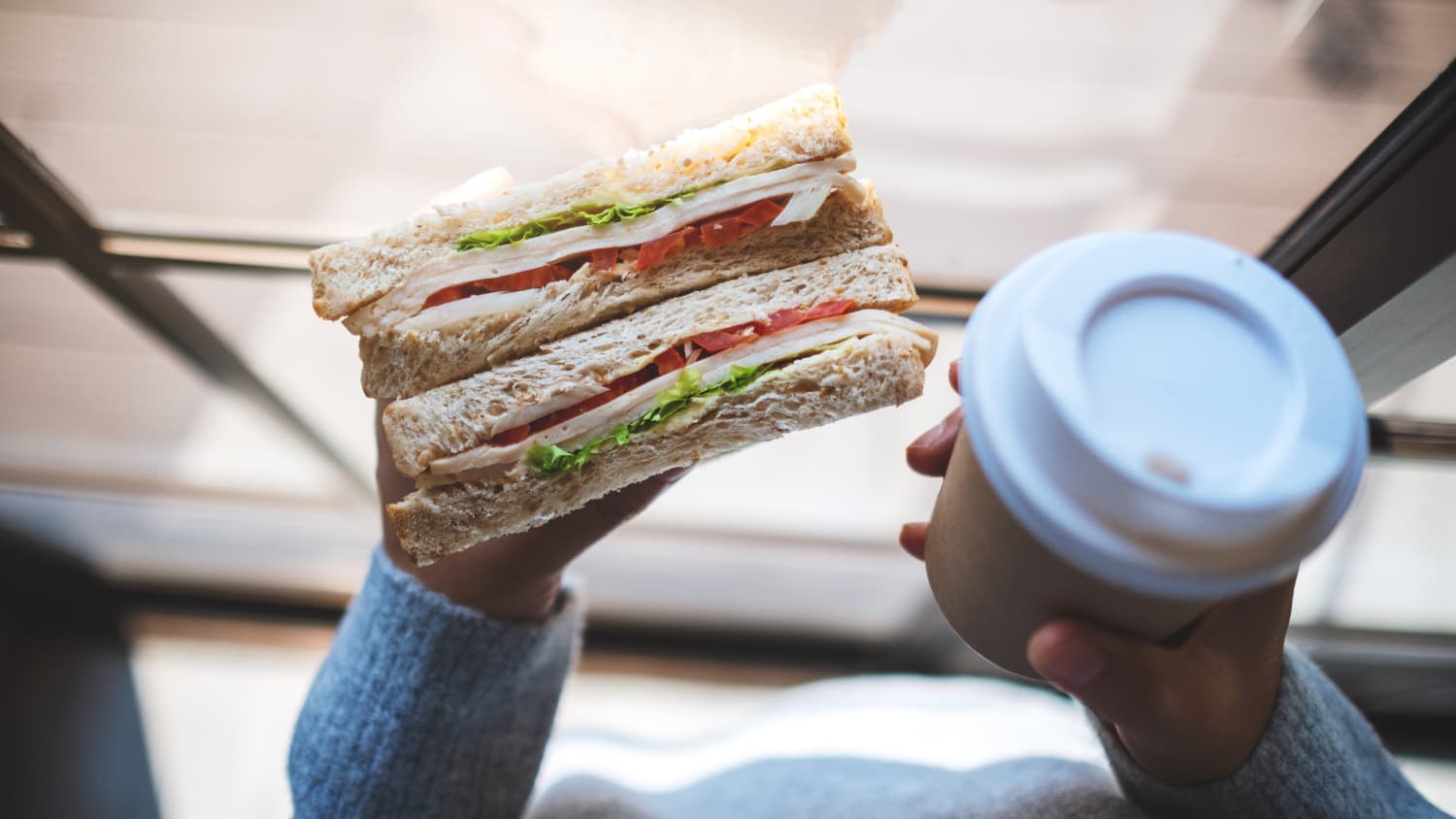 person holding a cold cut sandwich, worried about listeria