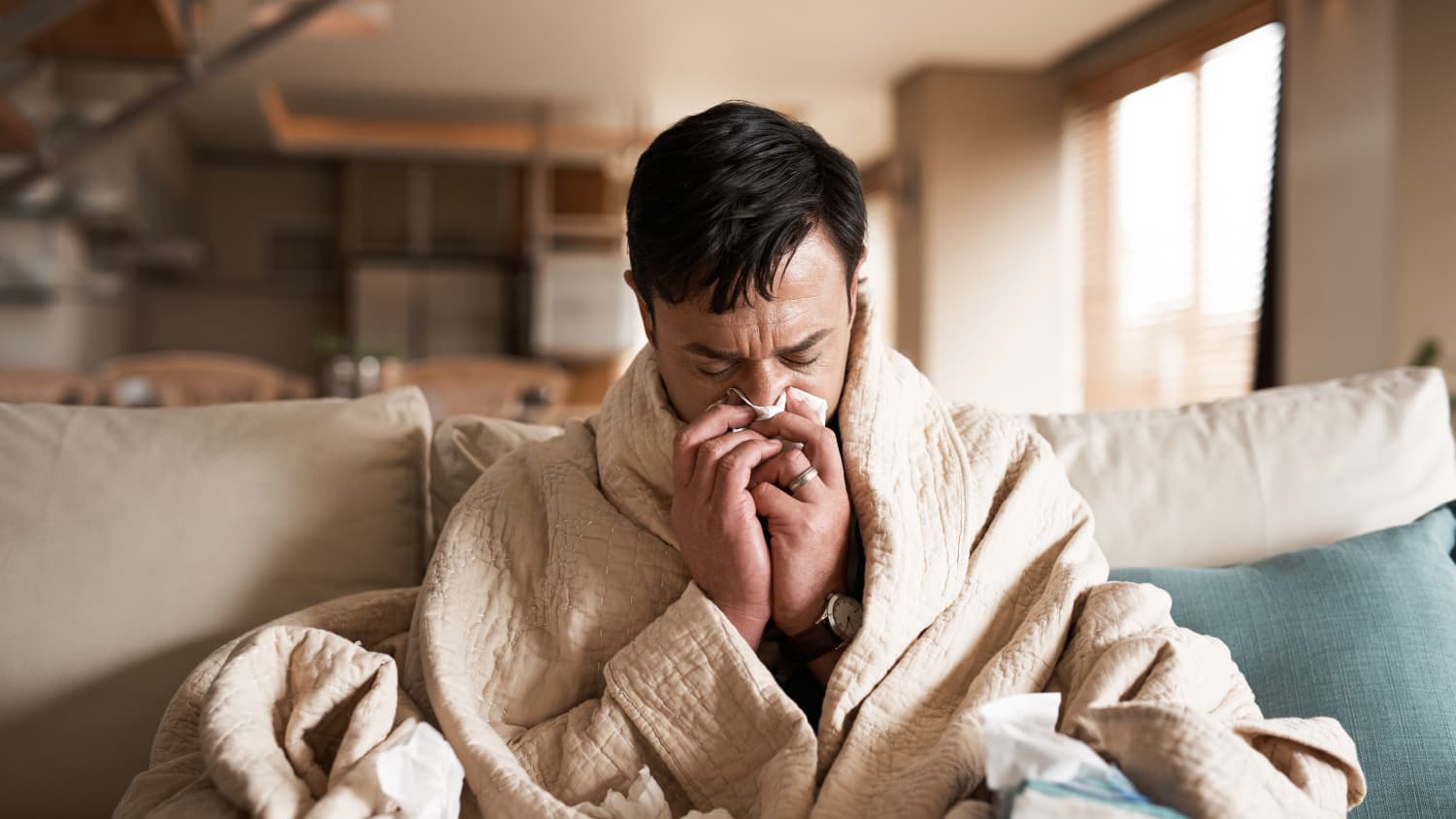 man sick with flu or covid