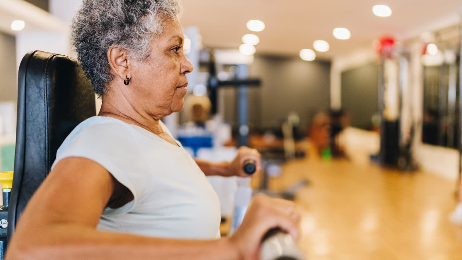 older woman with Parkinson's exercising