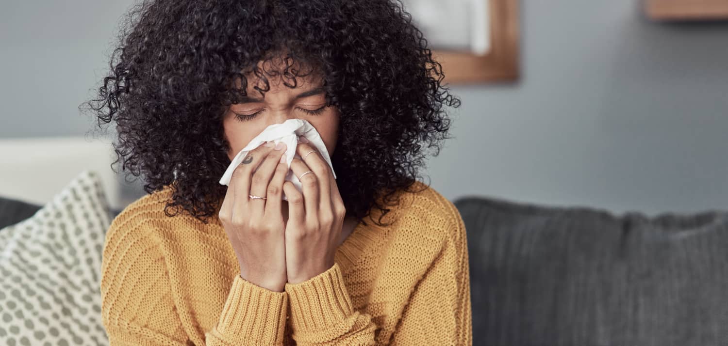 woman with flu after forgetting to take FluMist vaccine for influenza