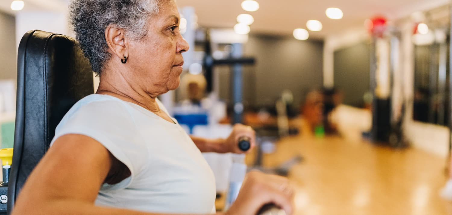 older woman with Parkinson's exercising
