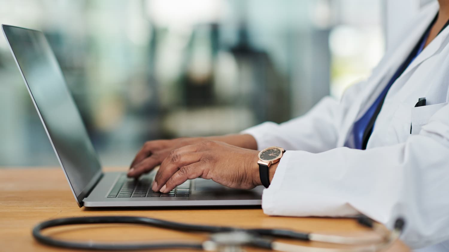 doctor on a laptop, representing to 300+ providers on CT Magazine's Top Doctors list in 2024