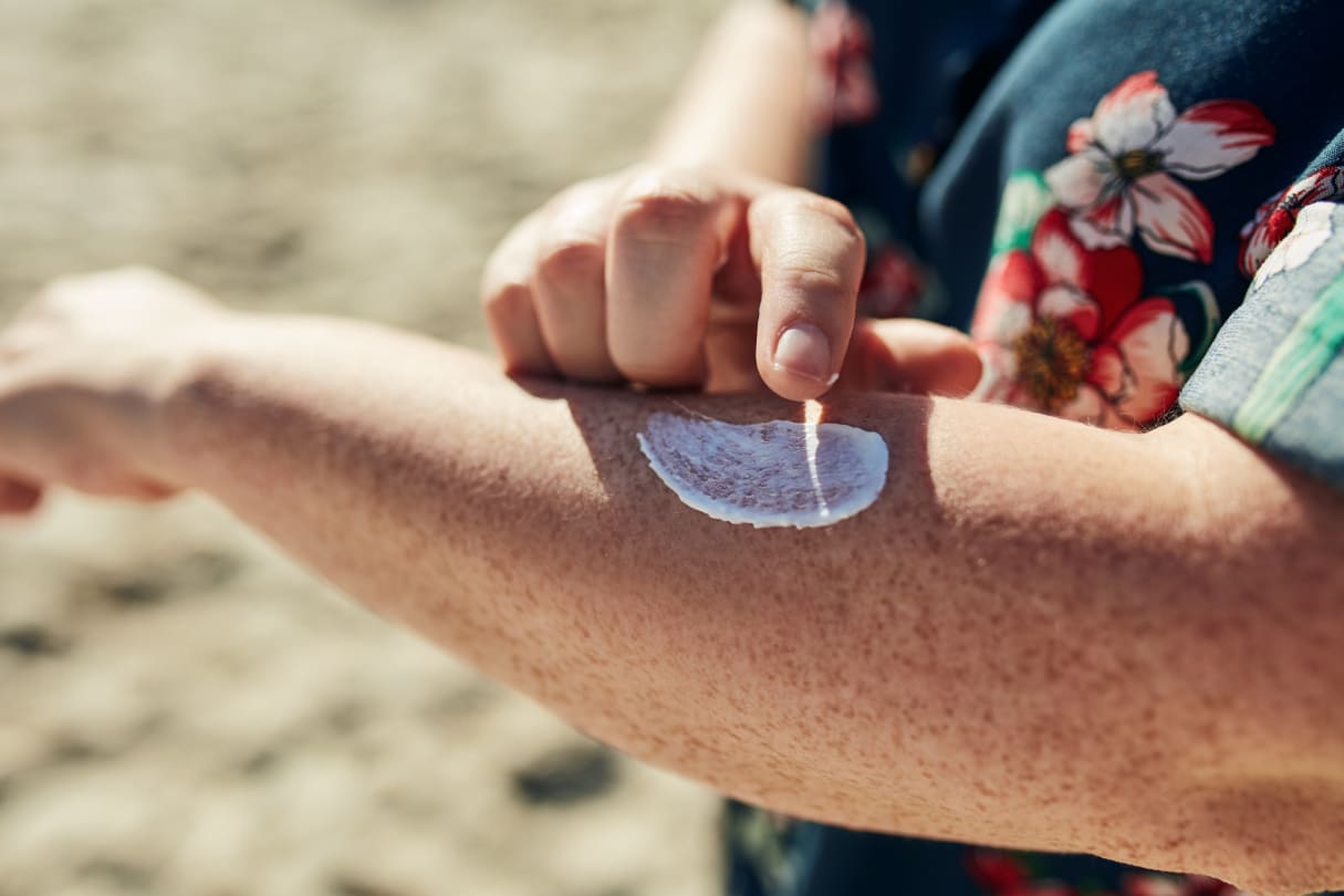 someone applying sunscreen