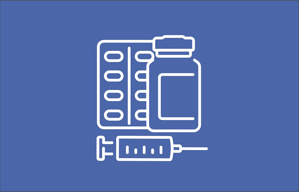 medicine bottle and syringe